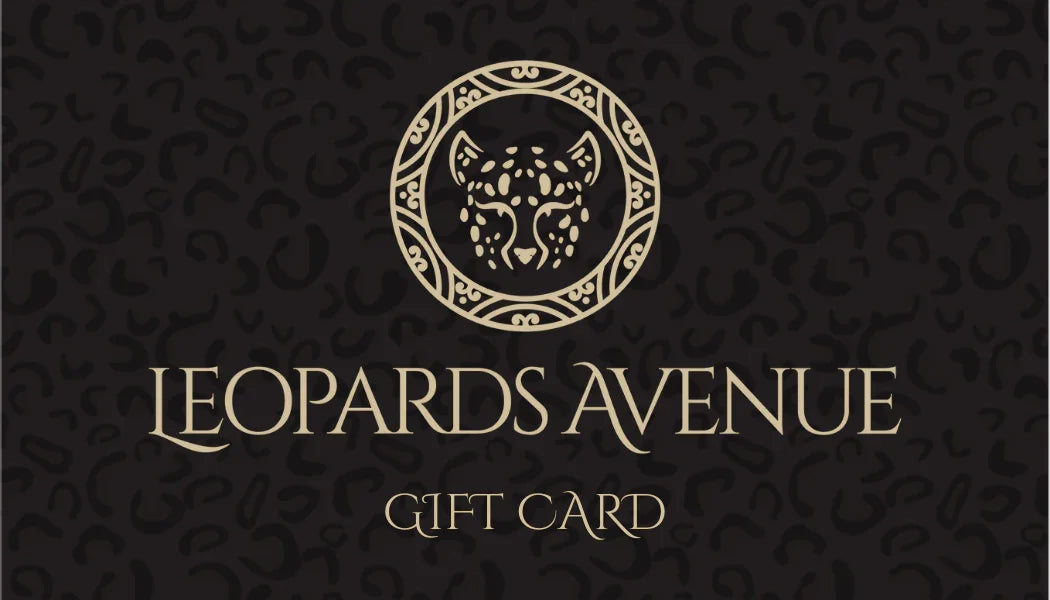 Leopards Avenue gift card with gold leopard head logo on black patterned background