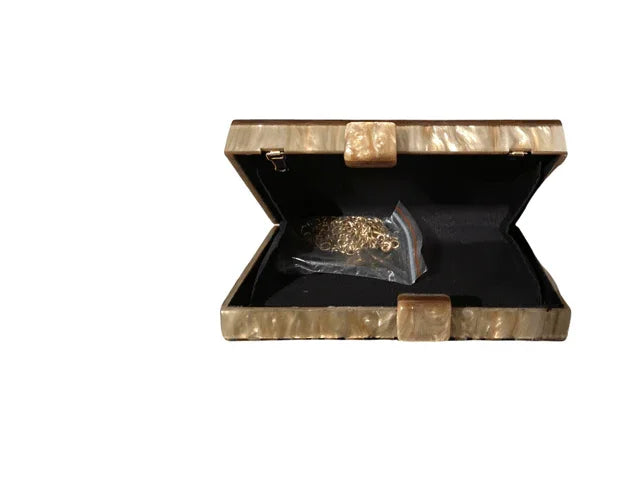 Beige marbled jewelry box open with gold chain inside, luxury storage accessory