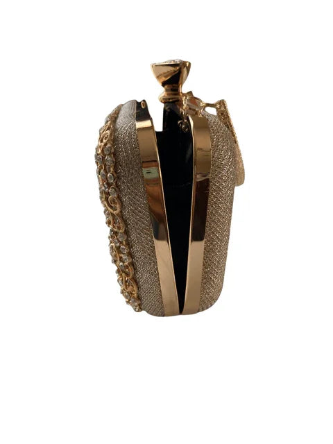 Gold glitter clutch purse with rhinestone detail and metallic trim, partially open